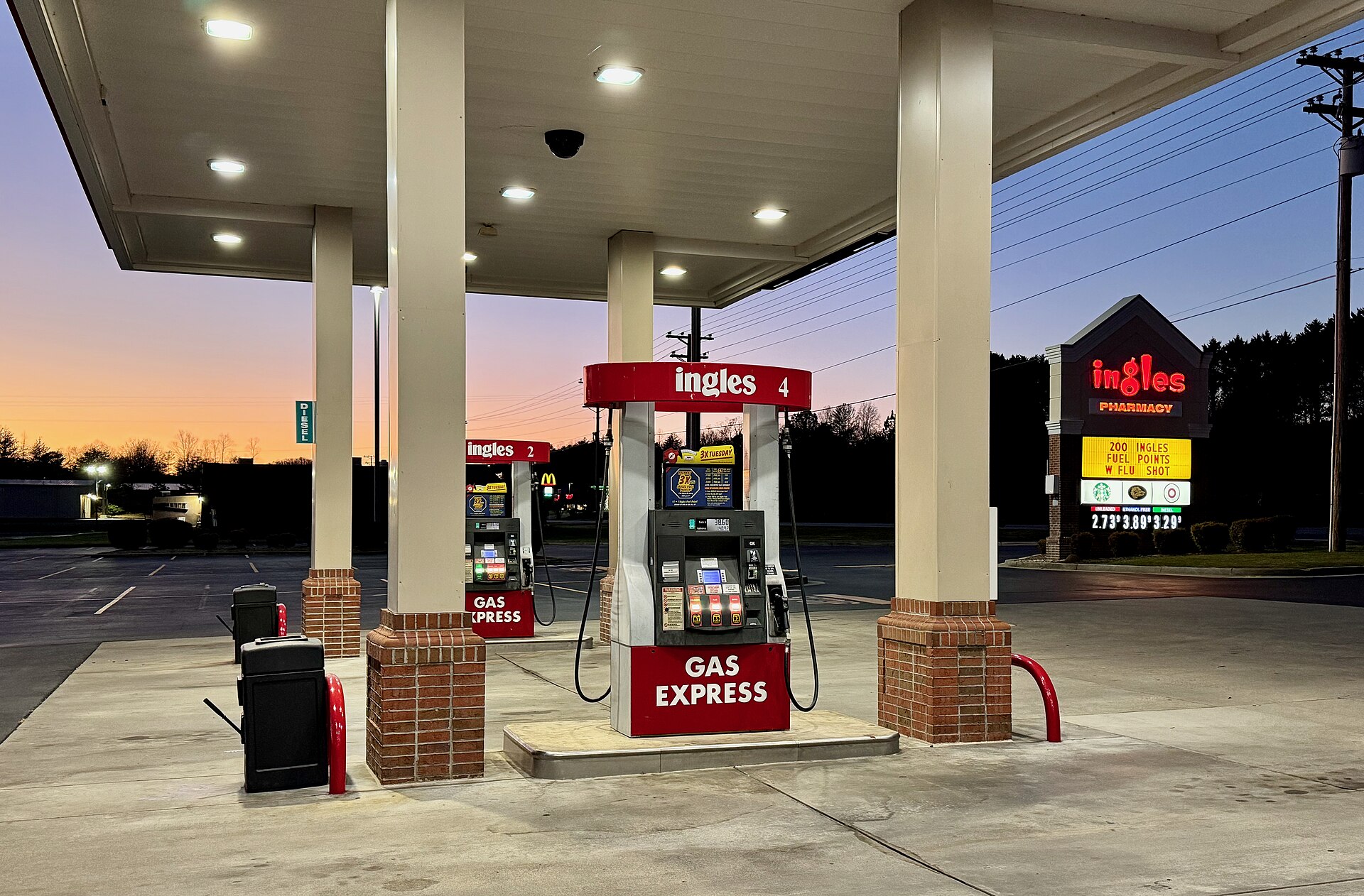 Ingles Markets gas station pumps in Hayesville, North Carolina, at sunset.jpg